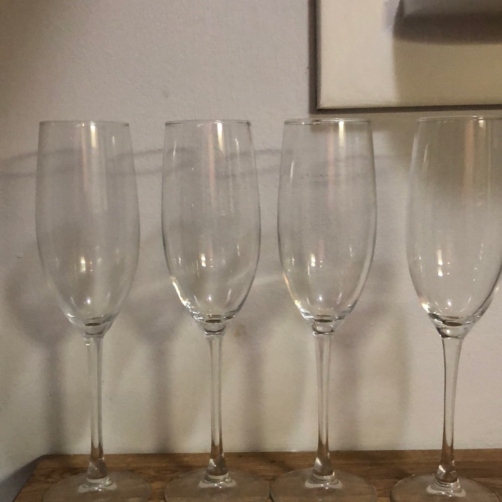 20 pieces Crate and Barrel tall champagne flutes. Set of 20.